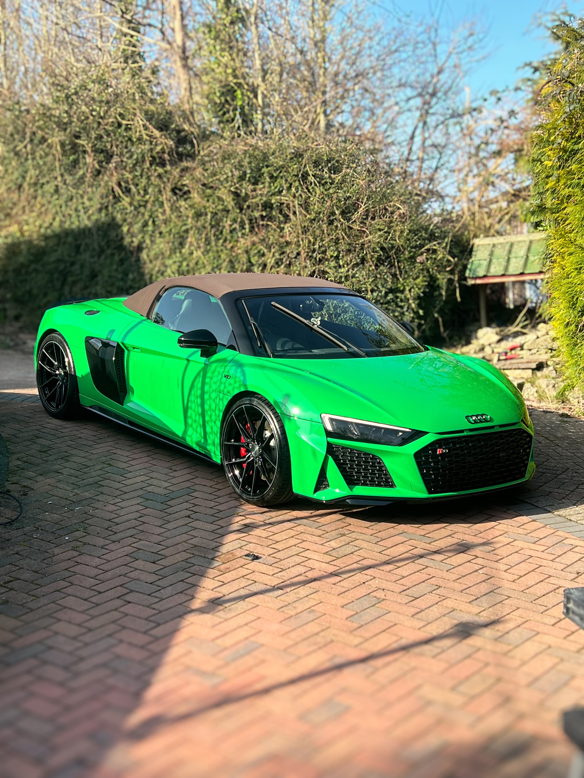 Bright green Audi roadster after detailing