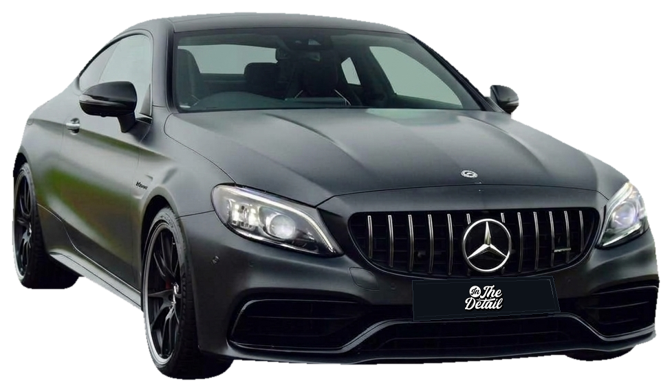 Charcoal Mercedes coupe isolated from its background